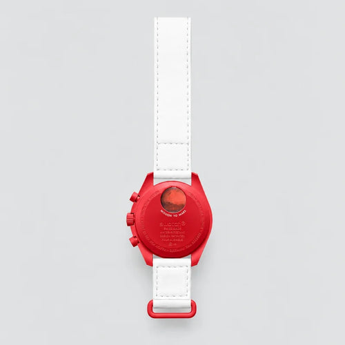 Mission to Mars, back view of the watch with its strap: red case with a white dial and a white strap.